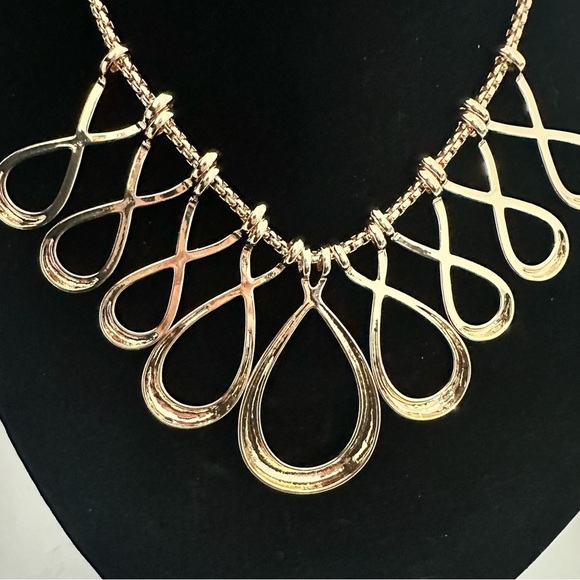 Erica Lyons shiny, gold toned, Infinity design bib necklace, statement piece. - Picture 3 of 10